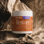 Longplay Groundwork Restore L-glutamine powder container, lifestyle photo